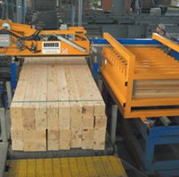 Lumber being bundled on the  PLTS machine.