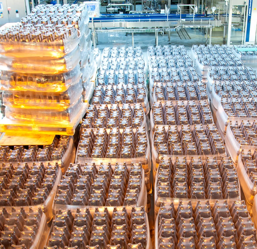 Stack of bottles bundled and wrapped.